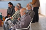 Villagers listening to what Kudret Bey has to say